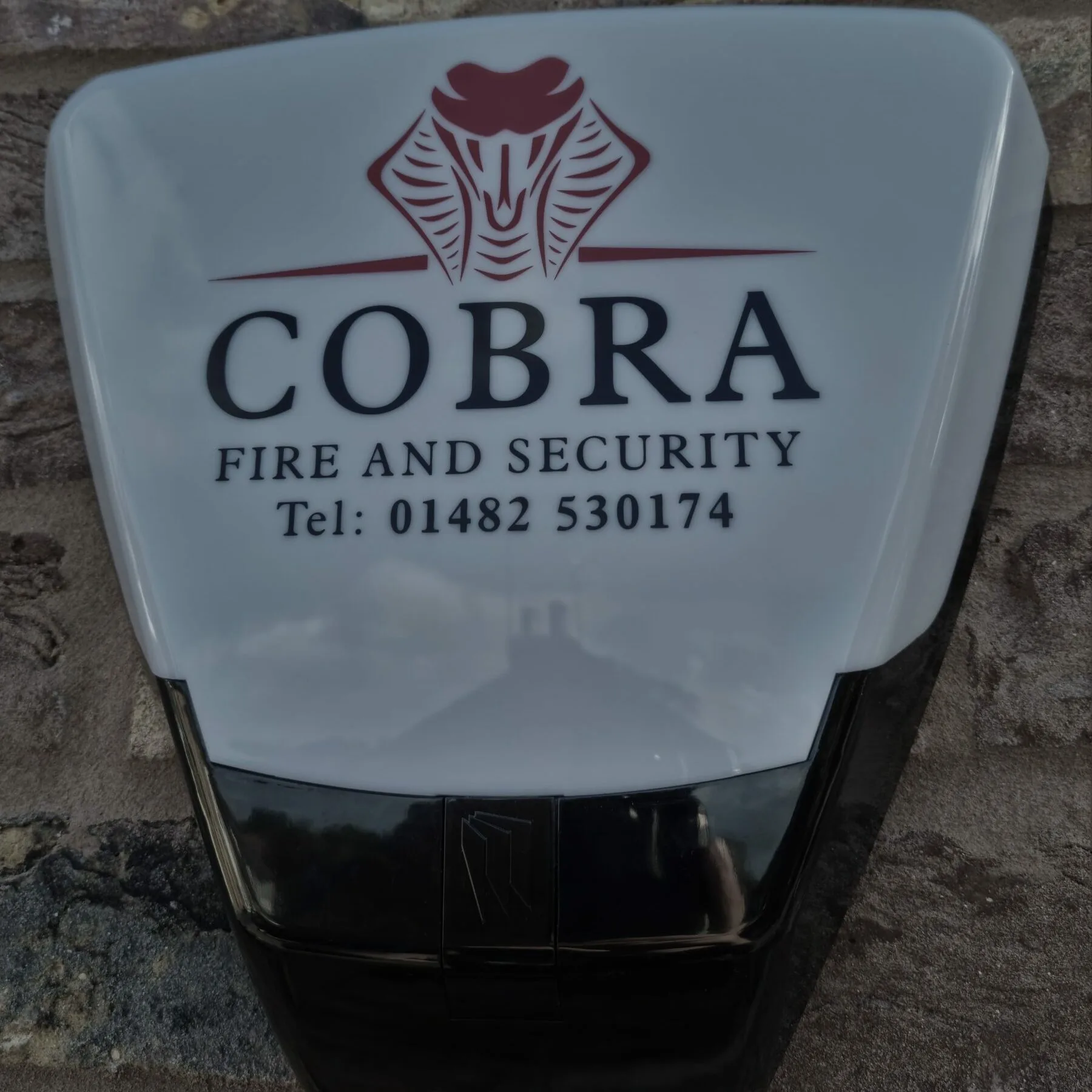 Intruder alarm bellbox with Cobra Fire & Security logo